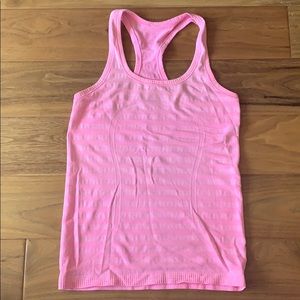Bright pink Lululemon exercise top size 4